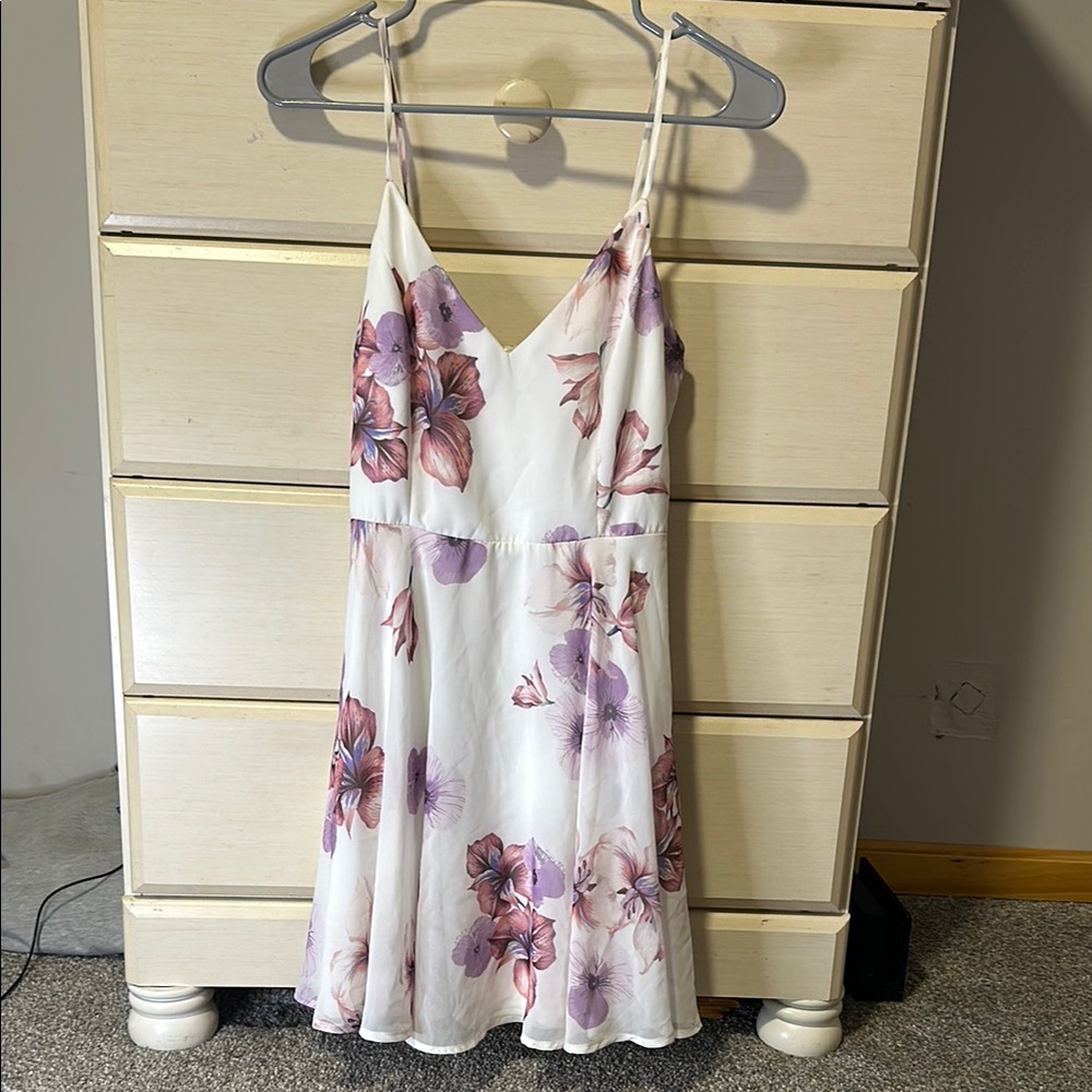 Women’s floral dress size Small never worn.